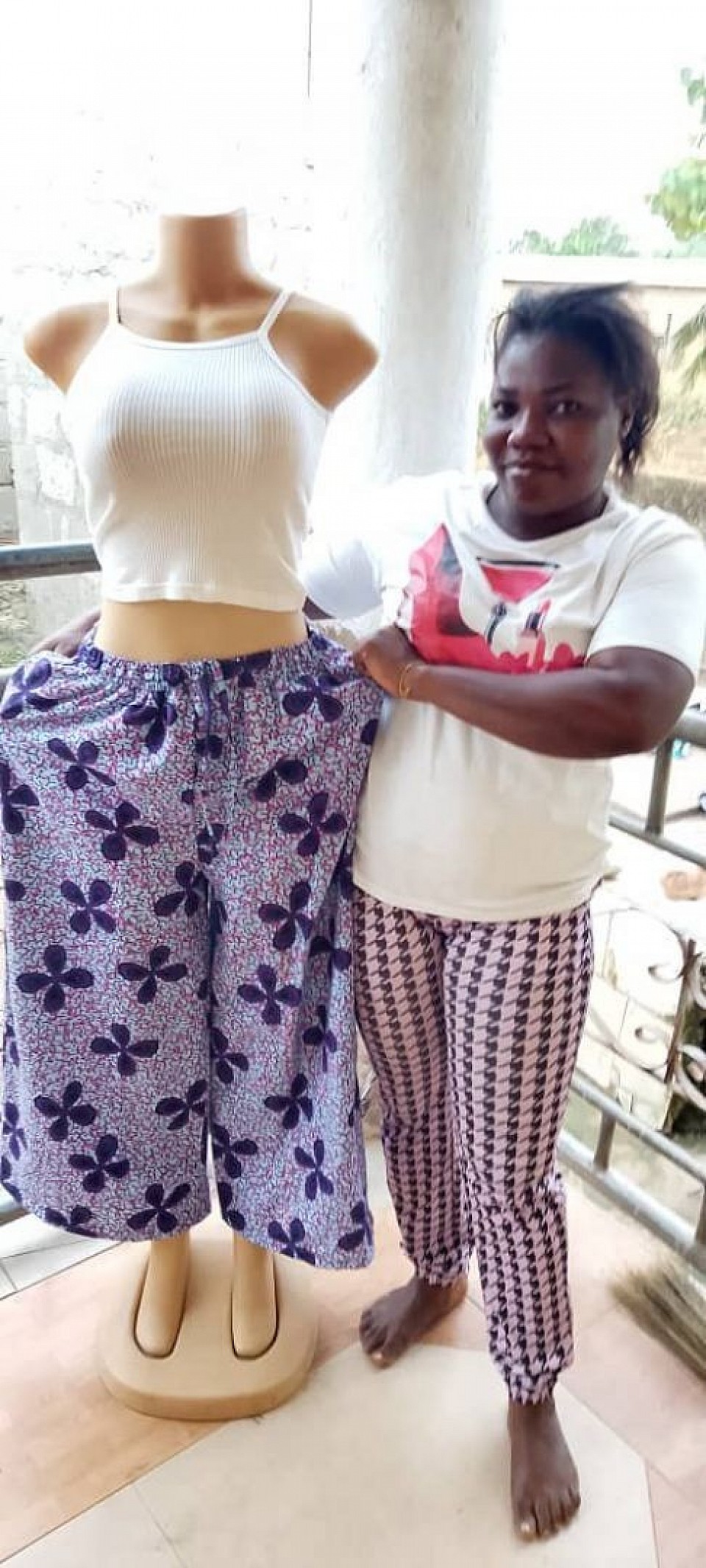 C.E.O of Mercy Amankwah Designs posed with her beautiful handy work